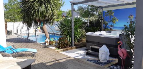 Maison 10 pers avec piscine chauffée et spa : Maisons de vacances proche de Saint-Armel
