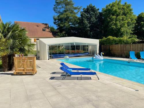 L'Annexe- guest house avec piscine : Maisons de vacances proche de Tilly