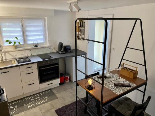 Le Pi'style(chambre,cuisine,salle d’eau,terrasse) : Appartements proche d'Engwiller