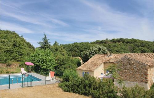 Awesome Home In St, Julien De Peyrolas With Wifi, Private Swimming Pool And Outdoor Swimming Pool : Maisons de vacances proche d'Issirac