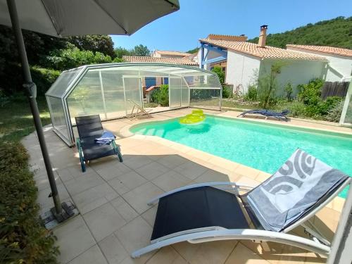 Confortable suite parentale avec jardin et piscine : Sejours chez l'habitant proche de Corbère