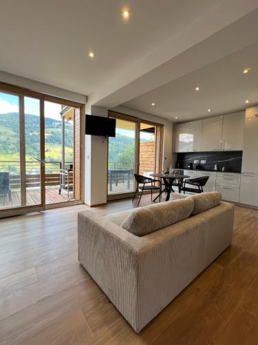 Magnifique appartement classé 4 étoiles avec Sauna et terrasse dans chalet : Appartements proche de La Bresse