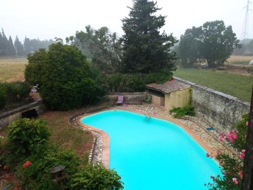 Ancien moulin restaurer avec piscine : Villas proche de Roquemaure