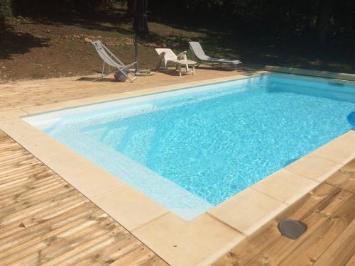 Maison chaleureuse avec piscine : Maisons de vacances proche de Saint-Jean-Lagineste