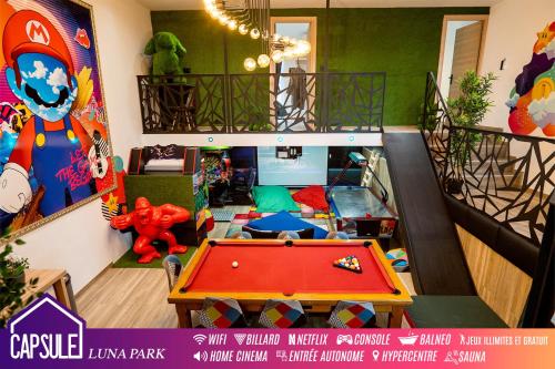 Capsule Luna Park - sauna - jeux d'arcade - jacuzzi - billard - 2 chambres : Appartements proche de Petite-Forêt