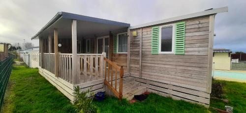 Bungalow de 3 chambres avec piscine partagee jardin amenage et wifi a Grandcamp Maisy a 1 km de la plage : Maisons de vacances proche de Cardonville