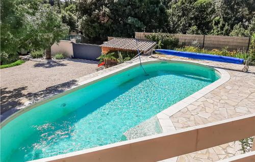 Stunning home in Saint-Gervais with 5 Bedrooms, Outdoor swimming pool and Heated swimming pool : Maisons de vacances proche de Saint-Laurent-de-Carnols