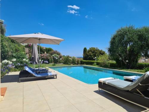 Superbe maison avec piscine, A/C, jardin, vue mer : Maisons de vacances proche de Biot