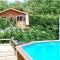 Maisons de vacances The Cabin with heated outdoor pool : photos des chambres