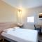 Hotels hotelF1 Annecy Argonay : photos des chambres