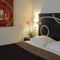 Appart'hotels Le Carmin by Popinns : photos des chambres