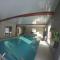 Maisons de vacances Maison avec piscine couverte Pilat Ardeche : photos des chambres