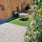 Appartements Studio with Garden - Pauseto West 4 - 2 min from Beach : photos des chambres