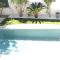 Villas Villa contemporaine avec piscine dans un cadre verdoyant : photos des chambres