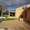 Maisons de vacances Magnifique villa climatisee avec piscine privee : photos des chambres