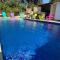 Maisons de vacances Villa piscine et climatisation : photos des chambres