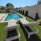 Maisons de vacances Proche d'Avignon, villa neuve, climatisee, piscine : photos des chambres