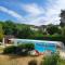 Maisons de vacances Maison avec piscine entre garrigue et Cevennes : photos des chambres