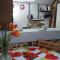 Appartements Fee maison with love appartement : photos des chambres