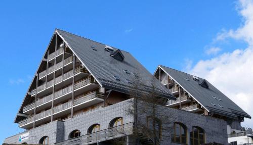Résidence Goélia Les Chalets de Super-Besse : Appart'hotels proche de Besse-et-Saint-Anastaise