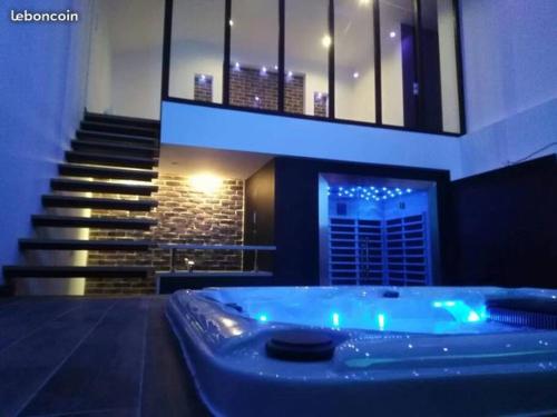 magnifique loft avec jacuzzi et sauna privatif : Appartements proche de Clairfayts