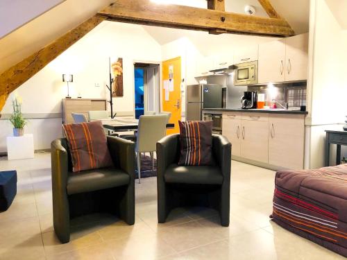 Appartement d'une chambre avec sauna jardin clos et wifi a La Ferriere aux Etangs : Appartements proche de Banvou