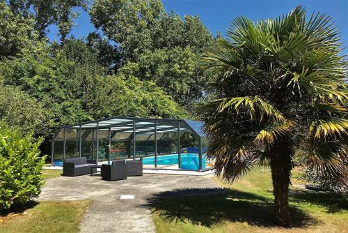 Villa de plain-pied avec WIFI, piscine privée sous abris haut à PLEUMEUR-BODOU - Ref 461 : Villas proche de Pleumeur-Bodou