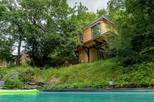 Le Moonloft insolite Tiny-House dans les arbres & 1 séance de sauna pour 2 avec vue panoramique : Maisons de vacances proche d'Osenbach