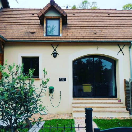 Maison de 2 chambres avec jardin clos et wifi a Sainte Genevieve les Gasny : Maisons de vacances proche de Limetz-Villez