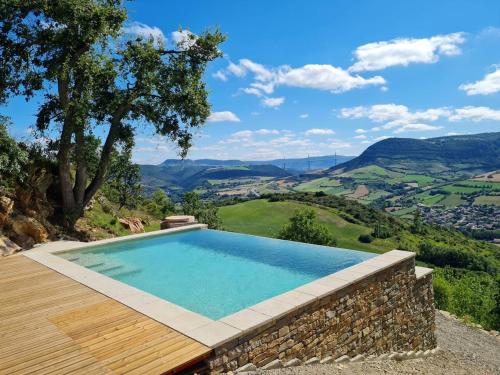 Villa d'une chambre avec piscine privee jacuzzi et jardin amenage a Saint Georges de Luzencon : Villas proche de Castelnau-Pégayrols