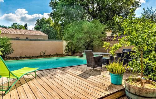 Nice home in Saint-Quentin-la-Poter with WiFi, 2 Bedrooms and Outdoor swimming pool : Maisons de vacances proche de Pougnadoresse