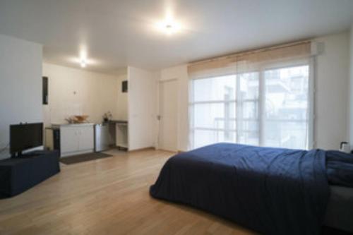 Lovely 1-bedroom unit with free parking on premise : Appartements proche de Bois-Colombes