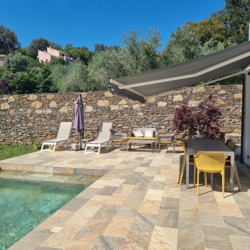 Rez de villa avec piscine, wifi, jardin clôturé : Appartements proche de Taglio-Isolaccio