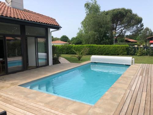 Maison landaise moderne piscine chauffée spa : Maisons de vacances proche de Lit-et-Mixe
