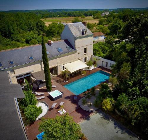 Magnifique villa avec piscine chauffée et jacuzzi : Villas proche de Champigny-sur-Veude