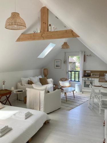 Studio cosy avec coin jardin : Appartements proche de Saint-Jacut-de-la-Mer