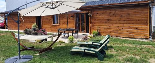 Chez LAVALOU Gîte 4* chaleureux en bois : Maisons de vacances proche de Lécussan
