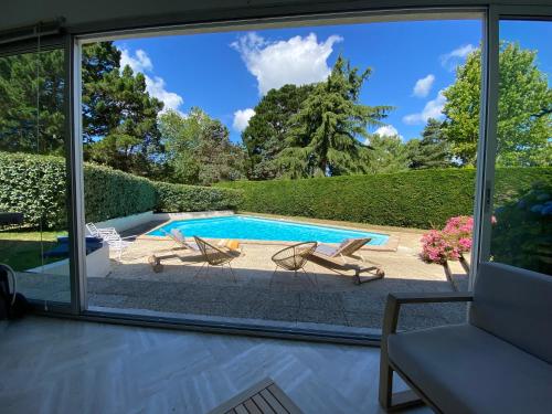 Villa 96 Golf de la Baule avec piscine et spa : Villas proche de Saint-André-des-Eaux