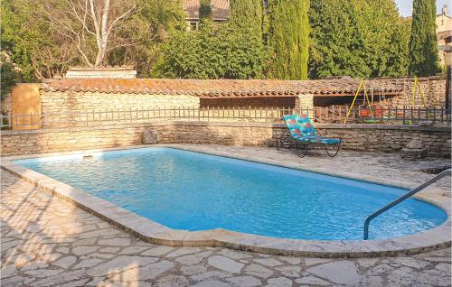 Amazing home in Cabrires-dAvignon with Outdoor swimming pool, WiFi and 5 Bedrooms : Maisons de vacances proche de Cabrières-d'Avignon