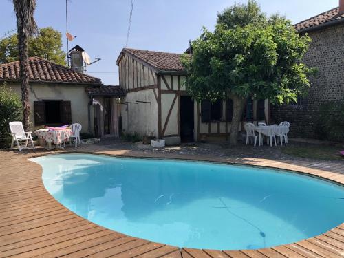 Maison d'une chambre avec piscine partagee jardin clos et wifi a Gee Riviere : Maisons de vacances proche d'Arblade-le-Bas