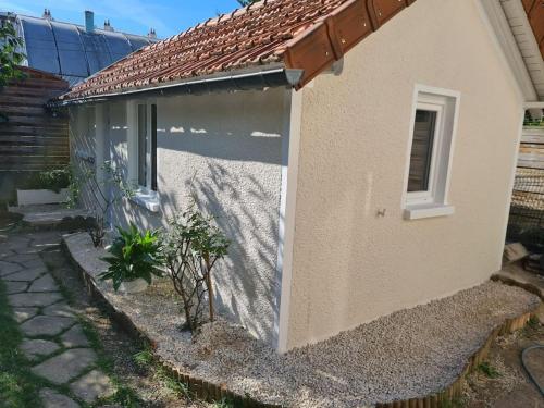 Petite maison cosy dans un jardin. : Appartements proche de Montigny-lès-Cormeilles
