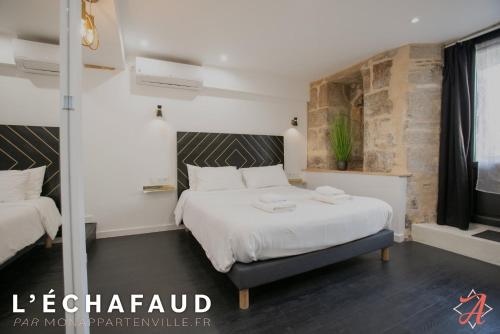 L' échafaud - Apparts de standing - Centre historique : Appartements proche d'Atur