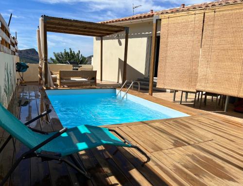 Patrimonio, maison cosy avec piscine privée : Maisons de vacances proche de Barbaggio