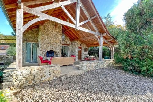 Beautiful guest house for two people on the bank of the Dordogne river : Maisons de vacances proche de Marnac