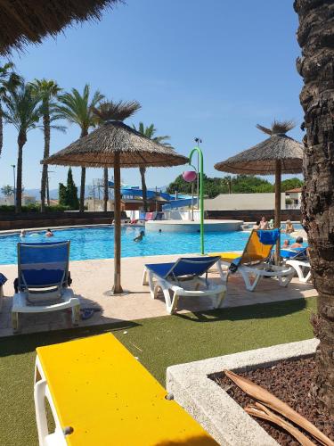 Bungalow de 3 chambres avec piscine partagee terrasse amenagee et wifi a Saint Cyprien a 3 km de la plage : Maisons de vacances proche de Théza