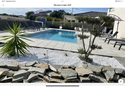 A 700m de la plage,villa FAMIGLIA avec piscine : Villas proche de Poggio-Mezzana