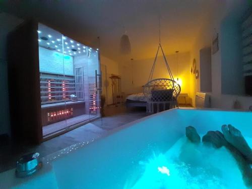 Cottage Interieur Spa classé 4 étoiles - balnéo et sauna privatif : Maisons de vacances proche de Germont