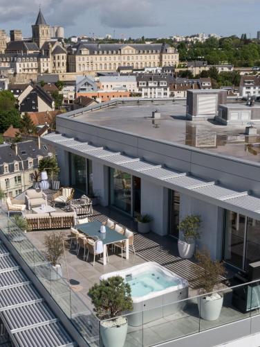 My Rooftop Caen - Appt avec Jacuzzi : Appartements proche de Mondeville