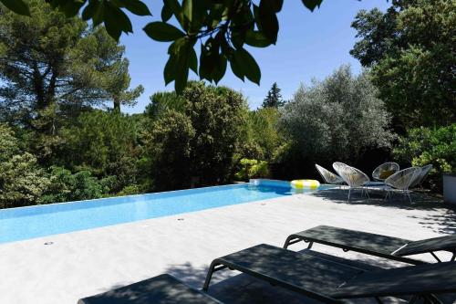 Contemporary Architect Villa, boho chic style, between Montpellier and Nîmes, 30 minutes from the sea : Villas proche de Villevieille