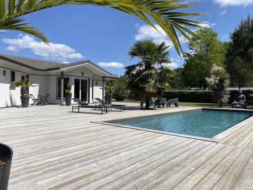 Villa avec piscine chauffée proche plage Océane : Villas proche de Le Temple